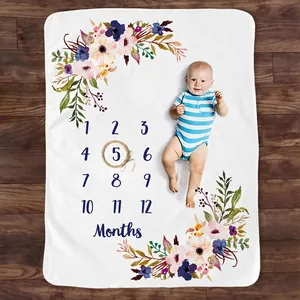 Floral baby milestone blanket made of soft flannel with months print for photography