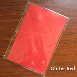 Glitter red A5 tissue paper for DIY crafts 100 sheets pack on wooden background