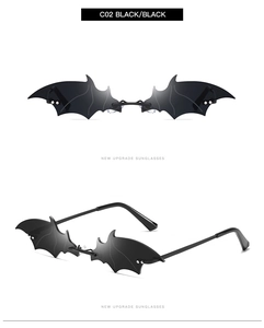Detail view of black bat shaped trendy sunglasses with premium metal hinges and finish