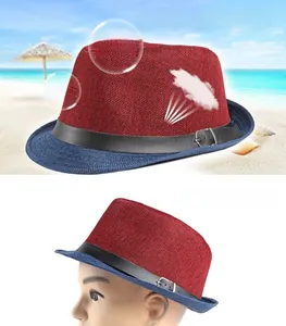 Detail of red and blue two-tone woven straw jazz hat with a black leather band and buckle