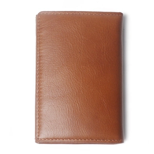 Vertical brown genuine leather wallet with fine stitching and textured finish