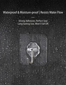 Waterproof transparent adhesive hook on wet gray wall for bathroom and kitchen use