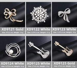 Detail view showing varied pearl and rhinestone brooch designs with sizes and weights