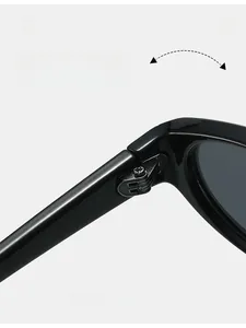 Macro shot of durable metal hinge on black oval sunglasses showing solid construction