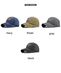 Detail view of washed cotton baseball caps with USA flag embroidery in four classic colors