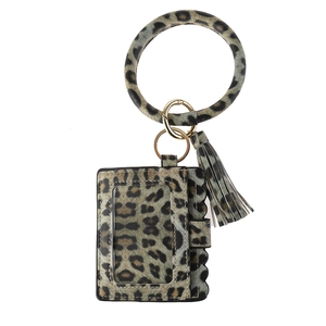 Close-up of leopard print PU leather wristlet keychain with tassel and card holder