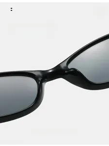 Detail view of comfortable integrated nose pads on black oval oversized sunglasses