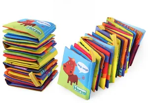 Detailed view of colorful infant cloth books with animal themes and hanging loops