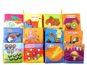 Detailed view of 12 pages of educational cloth books showing fruits, animals, and numbers