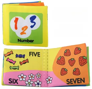 Detail of baby cloth book showing numbers and colorful fruits for early learning