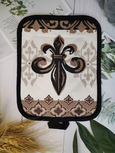 Detail view of thickened cotton baking mat with black trim on rustic white wooden table