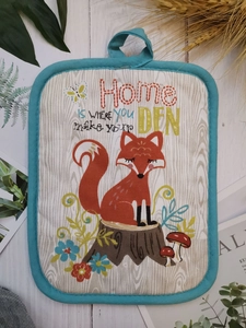 Detailed view of fox forest pattern quilted cotton pot holder with heat resistant hanging loop