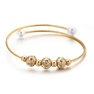 Golden double-layer stainless steel bangle with white pearls and sparkling crystal beads