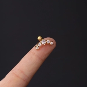 16G Gold curved stainless steel barbell earring with five crystal zircons on fingertip