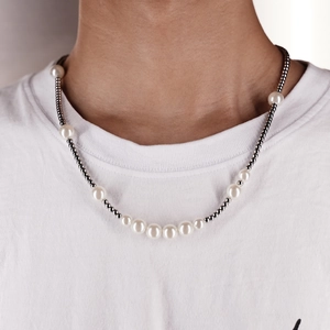 Unisex titanium steel beaded necklace featuring white pearls and silver metal spheres