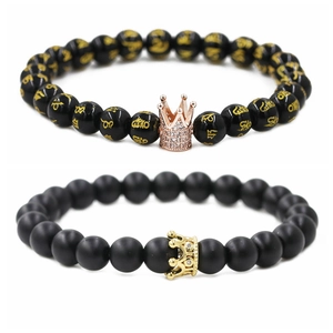 Polished and matte black beaded couple bracelets with rose gold and gold crown charms