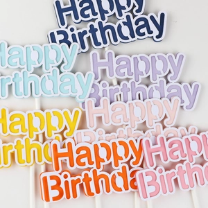 Colorful multi-layer Happy Birthday cake toppers in macaron shades for party decor