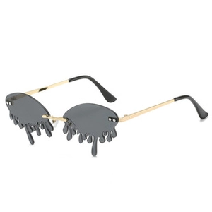 Detail of unique grey dripping liquid style lenses with a minimalist gold metal frame