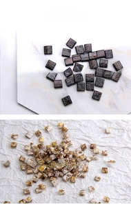 Macro detail of two-hole Tila glass beads in bronze and spotted patterns for DIY jewelry
