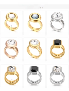 Collection of stainless steel rings with zircon stones in gold, silver and rose gold