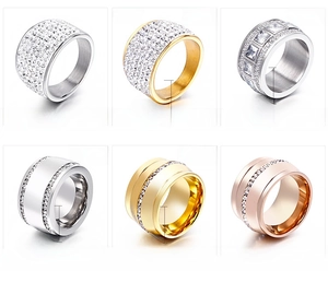 Detailed grid of wide rhinestone stainless steel rings in silver, gold and rose gold
