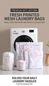 Macro shot of multiple sizes of fine mesh laundry bags with colorful tree prints