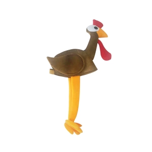 Close-up of plush turkey hat with red and orange accents for Thanksgiving party