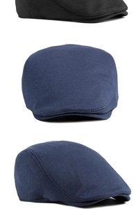 Detailed view of knitted cotton beret hats in black and navy blue from multiple angles