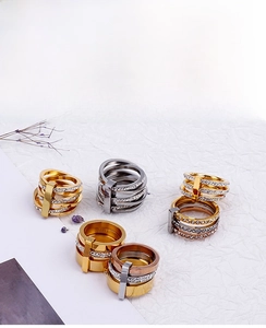 Detailed view of triple-layered 18k gold plated ring with micro-paved crystal accents