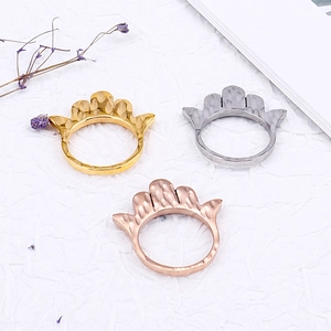 Three-piece stainless steel hamsa palm rings with embossed texture in gold, silver, and rose gold
