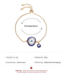 Detail view of Evil Eye bracelet with blue enamel charm and sizing specifications