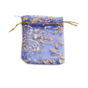 Blue organza gift pouch with gold rose pattern and satin drawstring on white background