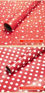 Detail of red wrapping paper rolls with white star and polka dot patterns for gifts