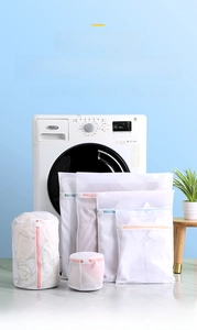 Close-up of durable polyester mesh laundry bags with macaron-colored hidden zippers