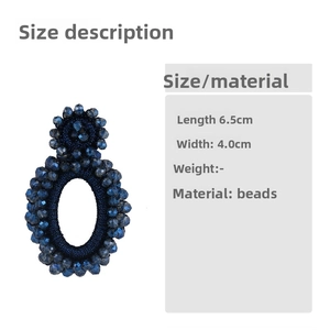 Detail view showing 6.5cm length and 4.0cm width of dark blue beaded bohemian earrings