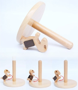 Vertical wooden paper towel holder featuring a 360 degree rotating cartoon animal clip