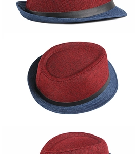Detail of a tricolor woven fedora hat featuring red, blue, and black contrast design
