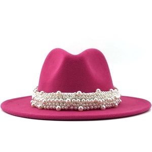Detailed view of the rose red wool felt fedora featuring elegant white pearl bead trim