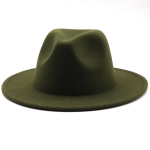 Detailed view of the olive green wool felt texture on this wide brim retro fedora hat