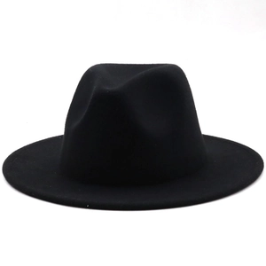 Classic black felt fedora hat featuring a vintage British style with a smooth wide brim