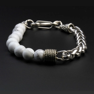 Close-up of men's beaded bracelet with white turquoise stones and chunky steel chain link