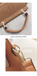 Detail of brown matte leather shoulder bag showing gold hardware and detachable strap