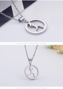 Detailed view of silver stainless steel necklace with running girl silhouette pendant