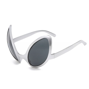 Detailed view of silver alien-shaped party glasses with metallic matte finish and dark lenses