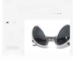 Detail of silver alien party glasses made of eco-friendly PC material with dark lenses