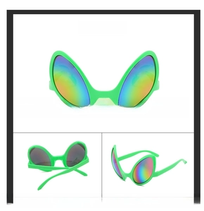 Detail view of alien party sunglasses with green frames and rainbow reflective lenses