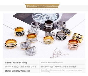 Macro detail of gold and silver stainless steel rings with zircon pave setting