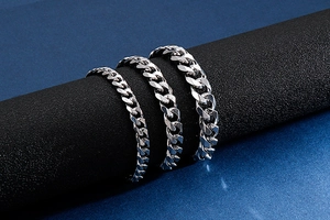 Detailed comparison of three widths of polished silver Cuban link chain bracelets