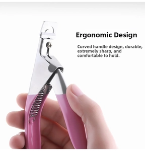Close-up of pink ergonomic handle and stainless steel spring on nail clipper