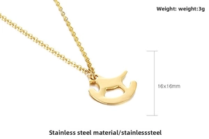 Detailed view of rocking horse pendant in gold stainless steel with 16x16mm size label